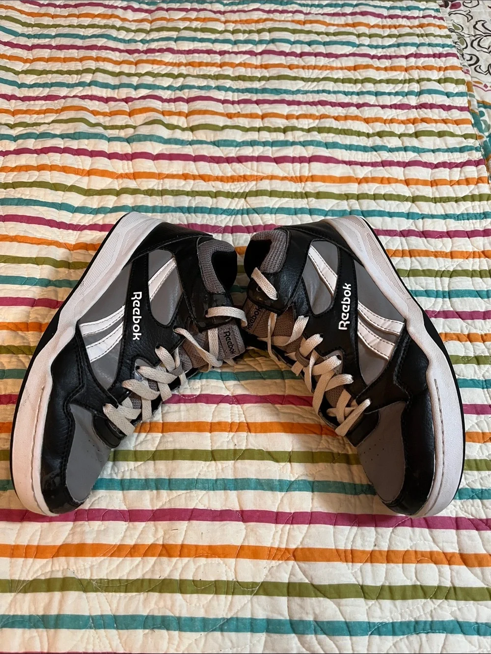 Gray and black Reebok youth size 5